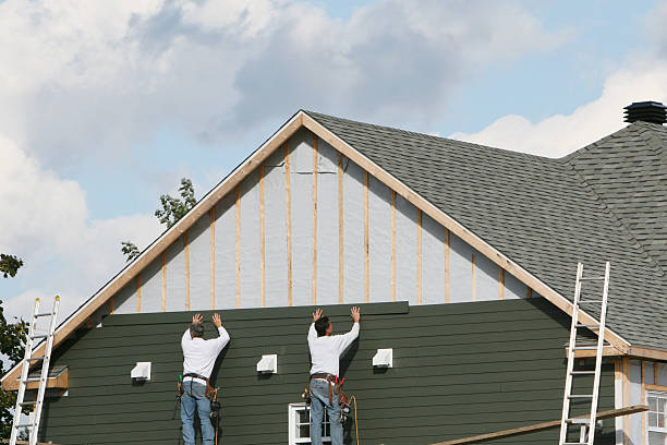 Professional Storm Damage Siding Repair technician working in Weston, WV